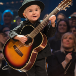 Nobody saw this coming, a tiny first grader steps onto the stage, grips the mic, and then, BOOM The second he starts singing a Johnny Cash classic, the entire room falls silent in sheer amazement, His voice, Unbelievably deep, soulful, and way beyond his years, The judges were stunned, the audience was on their feet, and you have to hear this to believe it